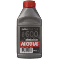 Szara butelka płynu hamulcowego Motul RBF 600 z czerwoną zakrętką.