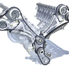 Mechanizm V-silnika z widocznym łańcuchem rozrządu, gotowy do wymiany łańcucha rozrządu.